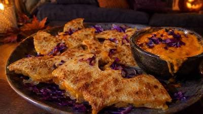 Golden Bat-Shaped Cheese Quesadillas with Orange Pepper Dip